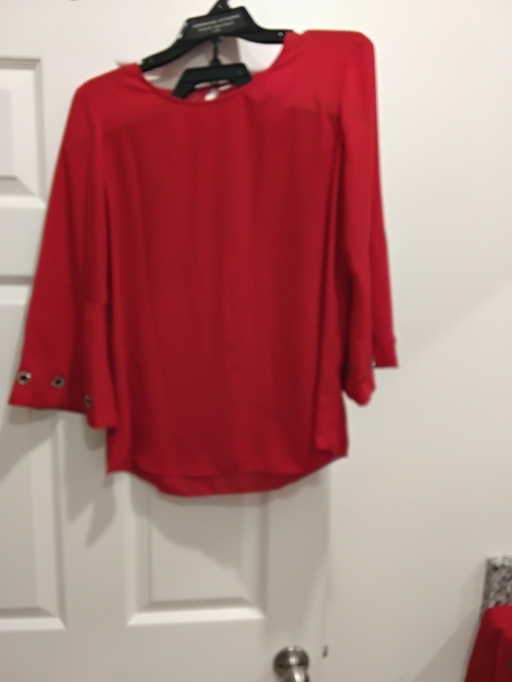 Vibrant Red Women’s Blouse with Grommet Sleeve Detail